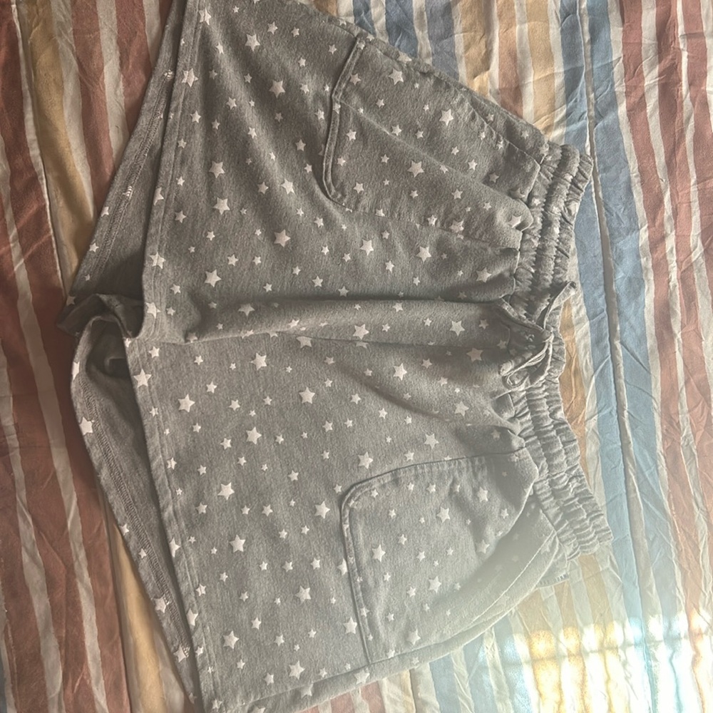 Gray shorts with white stars. Size XL worn a few times